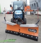 Preview: HILLTIP SnowStriker VTR Schneepflug in Orange an einem Klein-Traktor